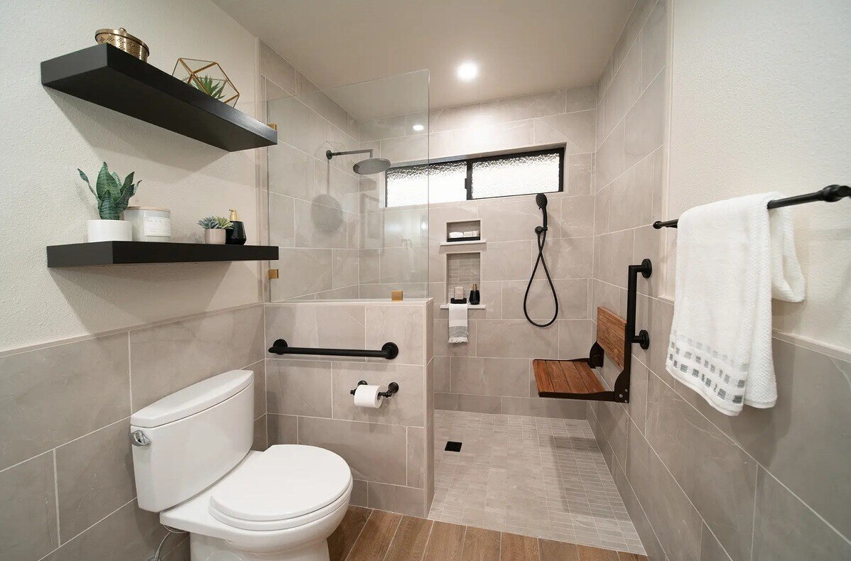 Curbless walk-in shower with bench in Fresno, CA bathroom by Imagine Remodeling