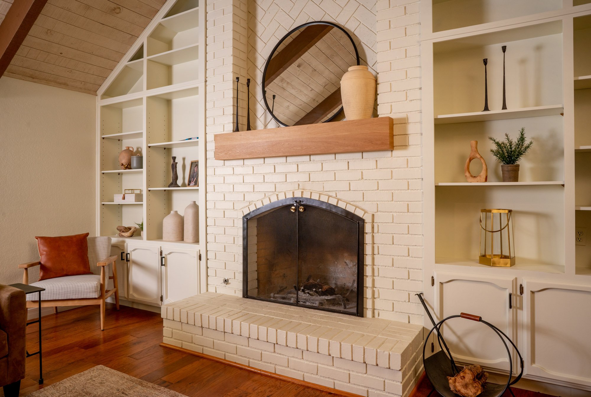 Painted brick fireplace in Fresno, CA home remodel by Imagine Remodeling