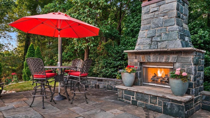 Red Patio Umbrella Near Green Plants